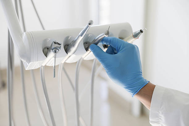 Professional Tooth Extraction technician working in Lockport Heights, IL